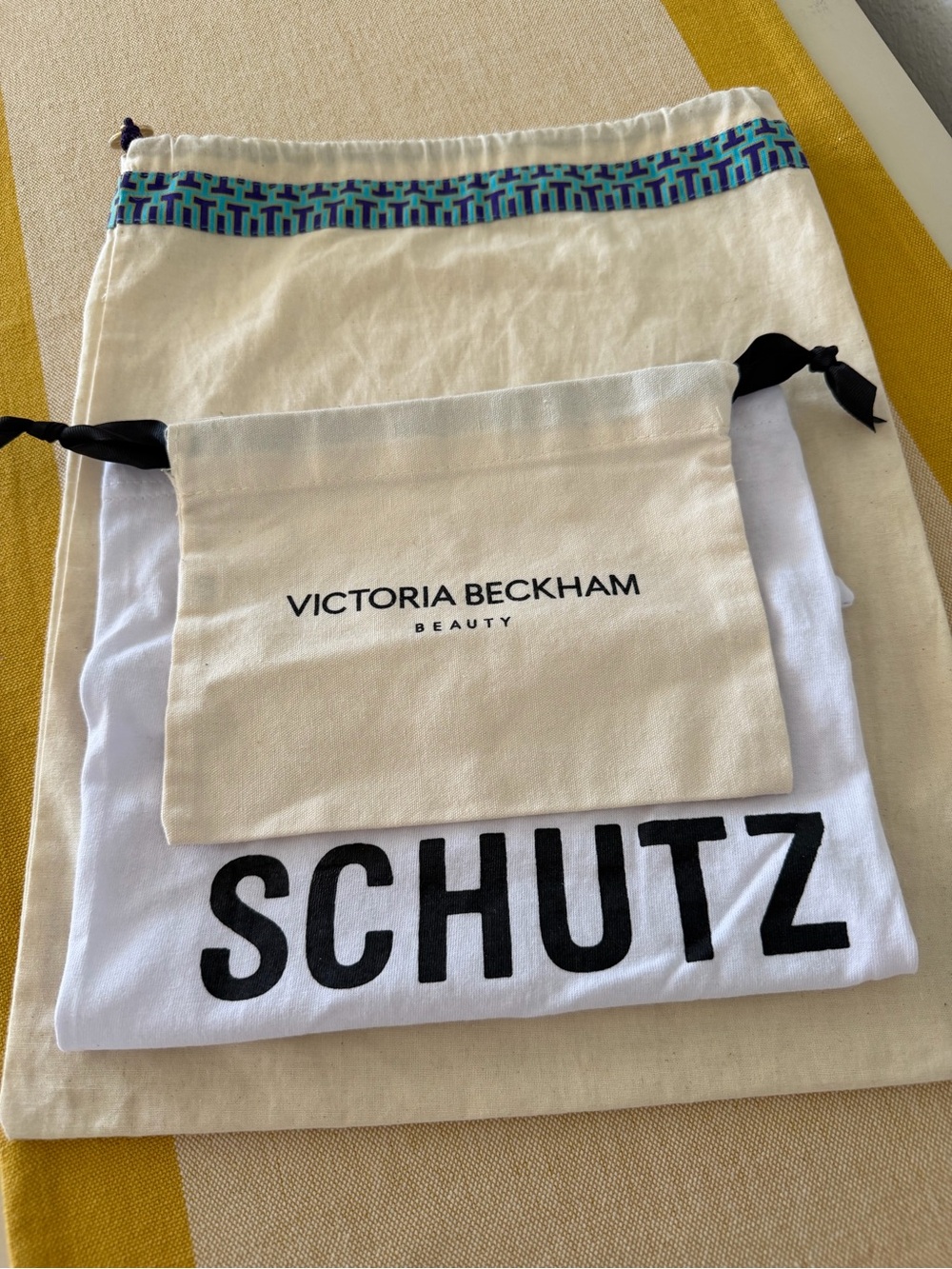 Victoria Beckham beauty pouch, Tory Burch, Schutz Dust Bag